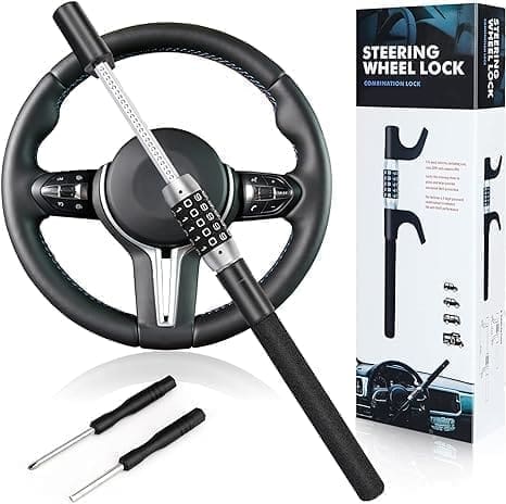 A steering wheel lock with two keys and a box.