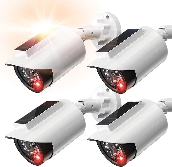 A set of four cameras with red lights on them.