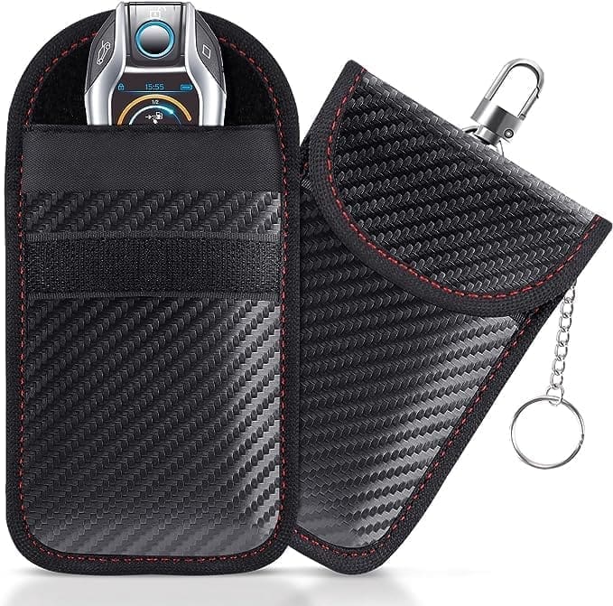 A car key holder and case with a keychain.