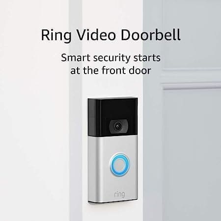 A video doorbell is mounted on the wall.