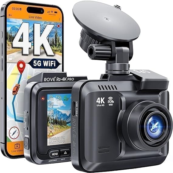 A car camera and phone with the screen showing 4 k.