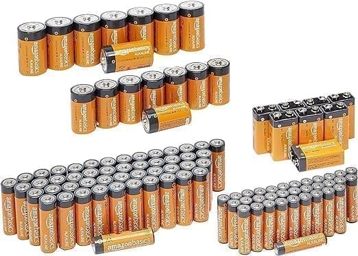 A group of batteries that are all stacked on top of each other.