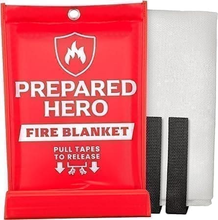 A fire blanket and two tapes are on the floor.