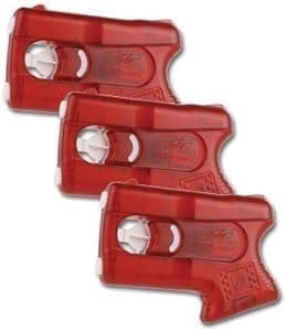 A group of three red guns that are in the shape of a gun.