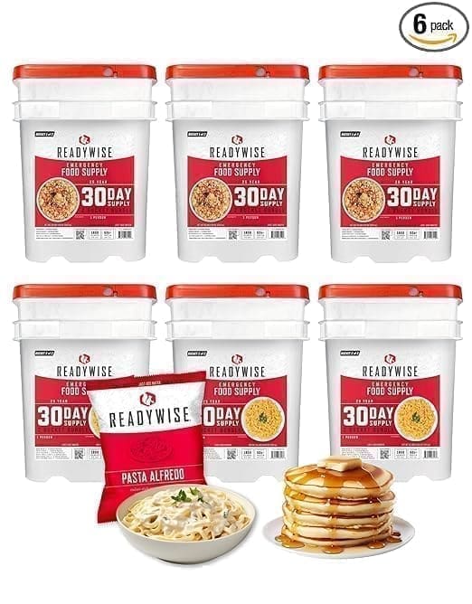 A stack of pancakes and some soup are in front of the package.